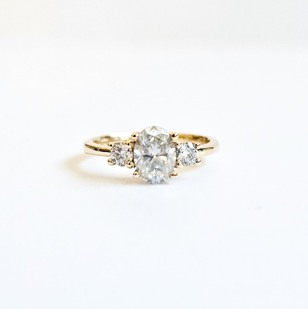Three Stone Round and Oval Moissanite Ring