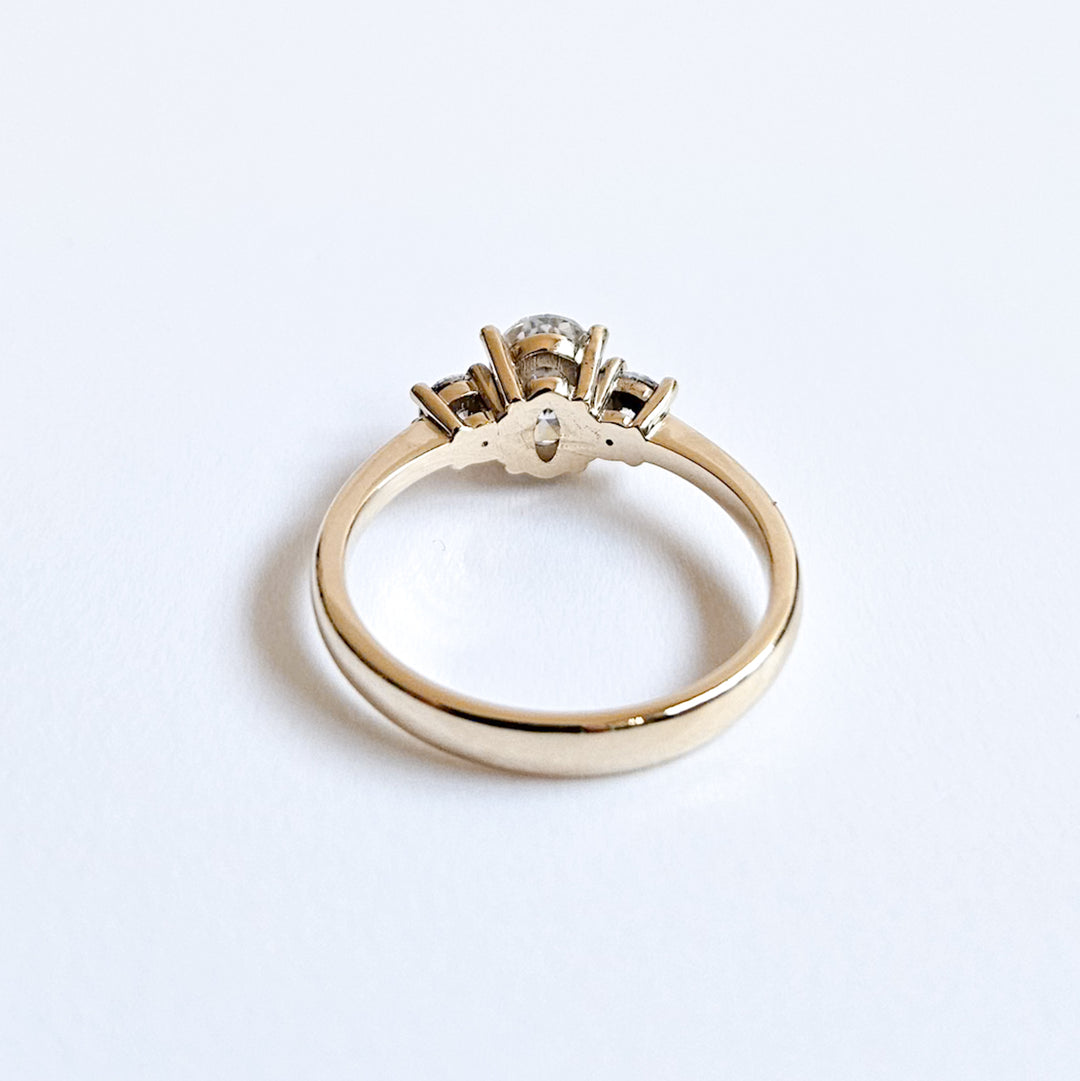 Three Stone Round and Oval Moissanite Ring