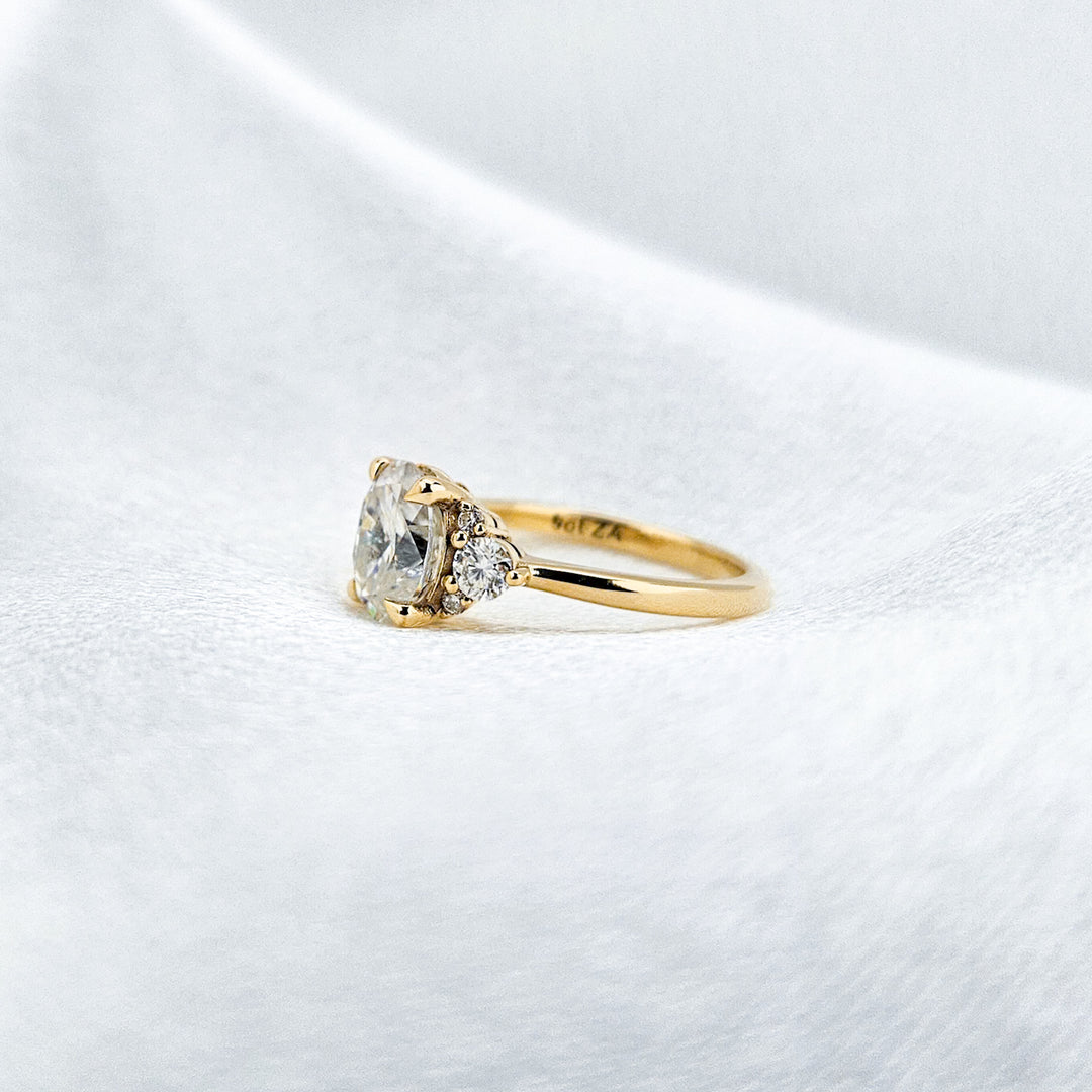 Oval and Round Cluster Moissanite Ring