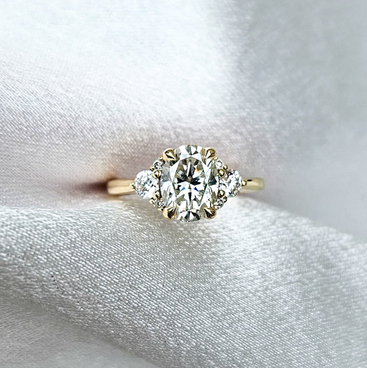 Oval and Round Cluster Moissanite Ring