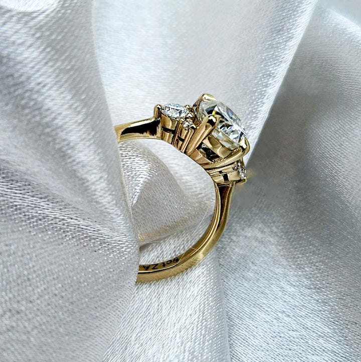 Oval and Round Cluster Moissanite Ring