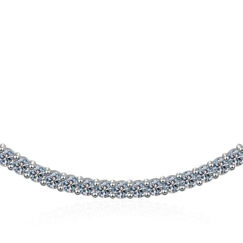 A modern curved bar moissanite necklace set in sterling silver