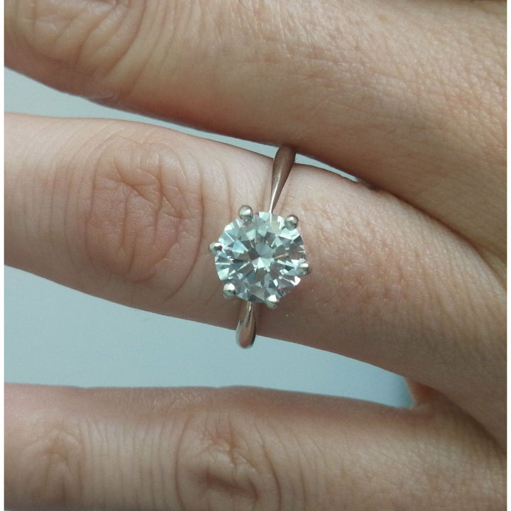 Signature Round Solitaire Moissanite Ring