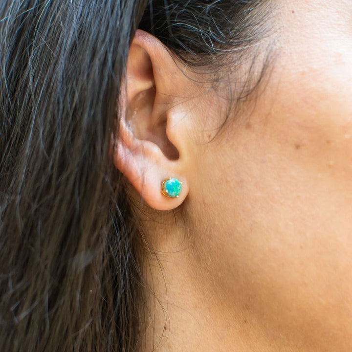 Sterling silver blue-green opal stud earrings plated in 18ct pure yellow gold