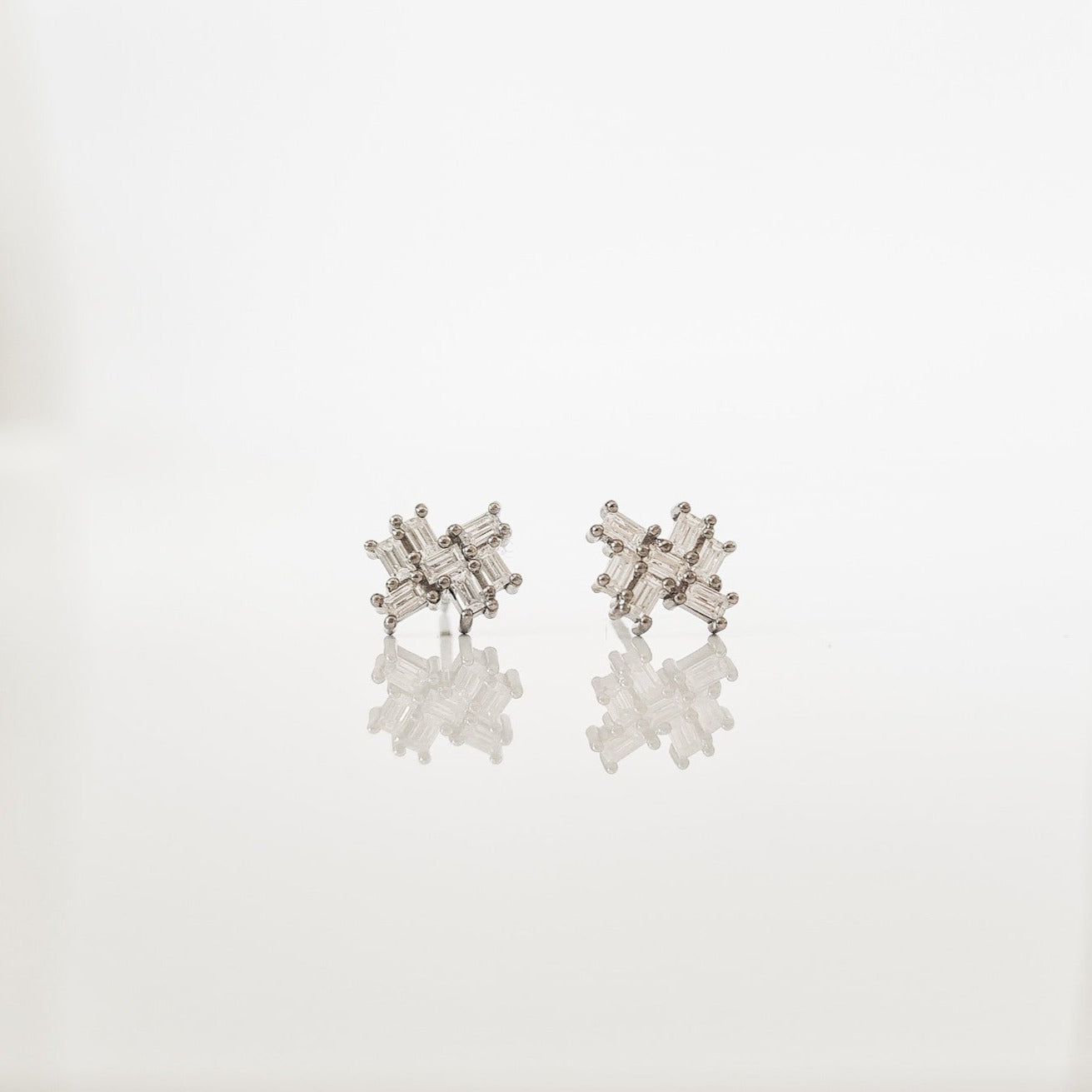 Baguette cut moissanite cluster studs set in sterling silver as worn by Marciel Hopkins for her wedding