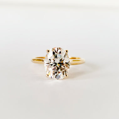 2ct oval moissanite solitaire engagement ring in 9ct yellow gold