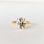 2ct oval moissanite solitaire engagement ring in 9ct yellow gold