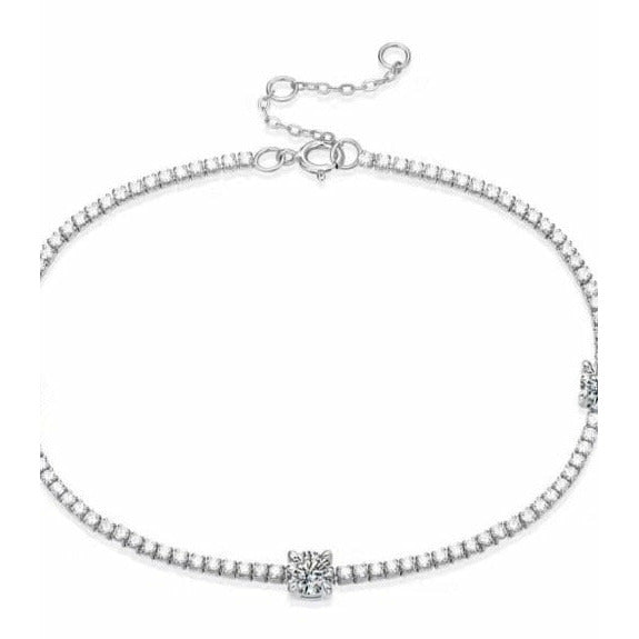 Adjustable length moissanite tennis bracelet with three round accent moissanite stones set in sterling silver