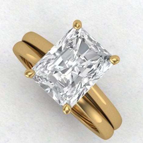 3ct radiant cut moissanite solitaire engagement ring in yellow gold with matching wedding band